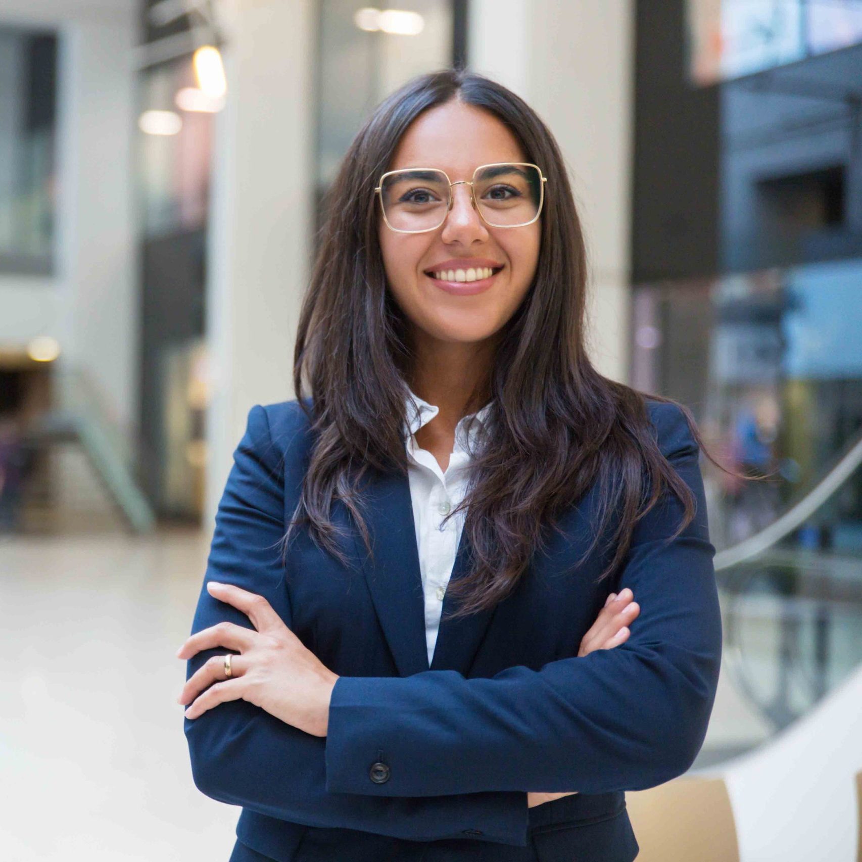 young-businesswoman-smiling-camera